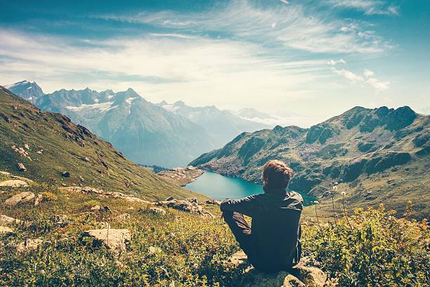 Person reflecting in peaceful natural environment